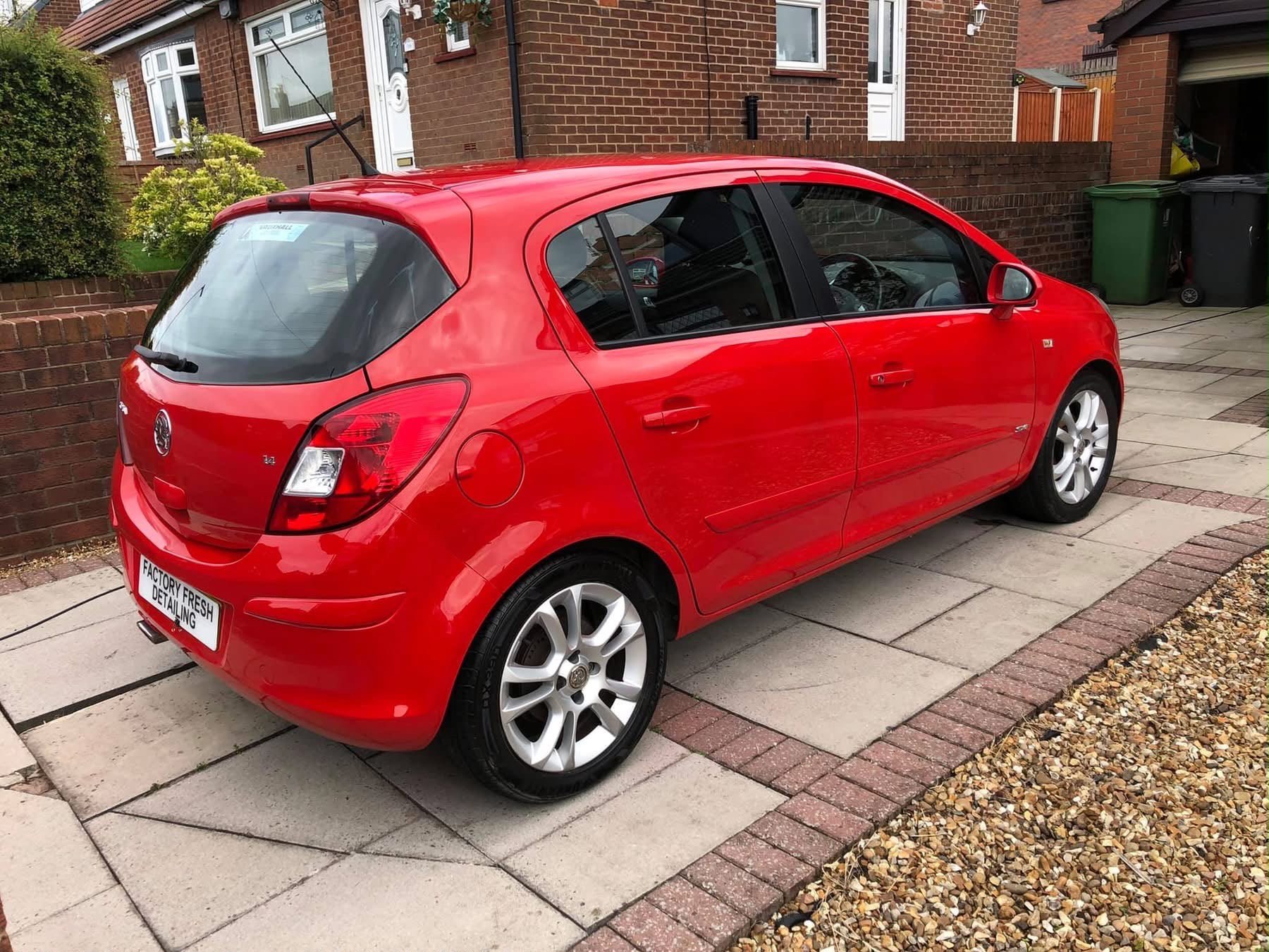 Red Vauxhall Astra detailing work