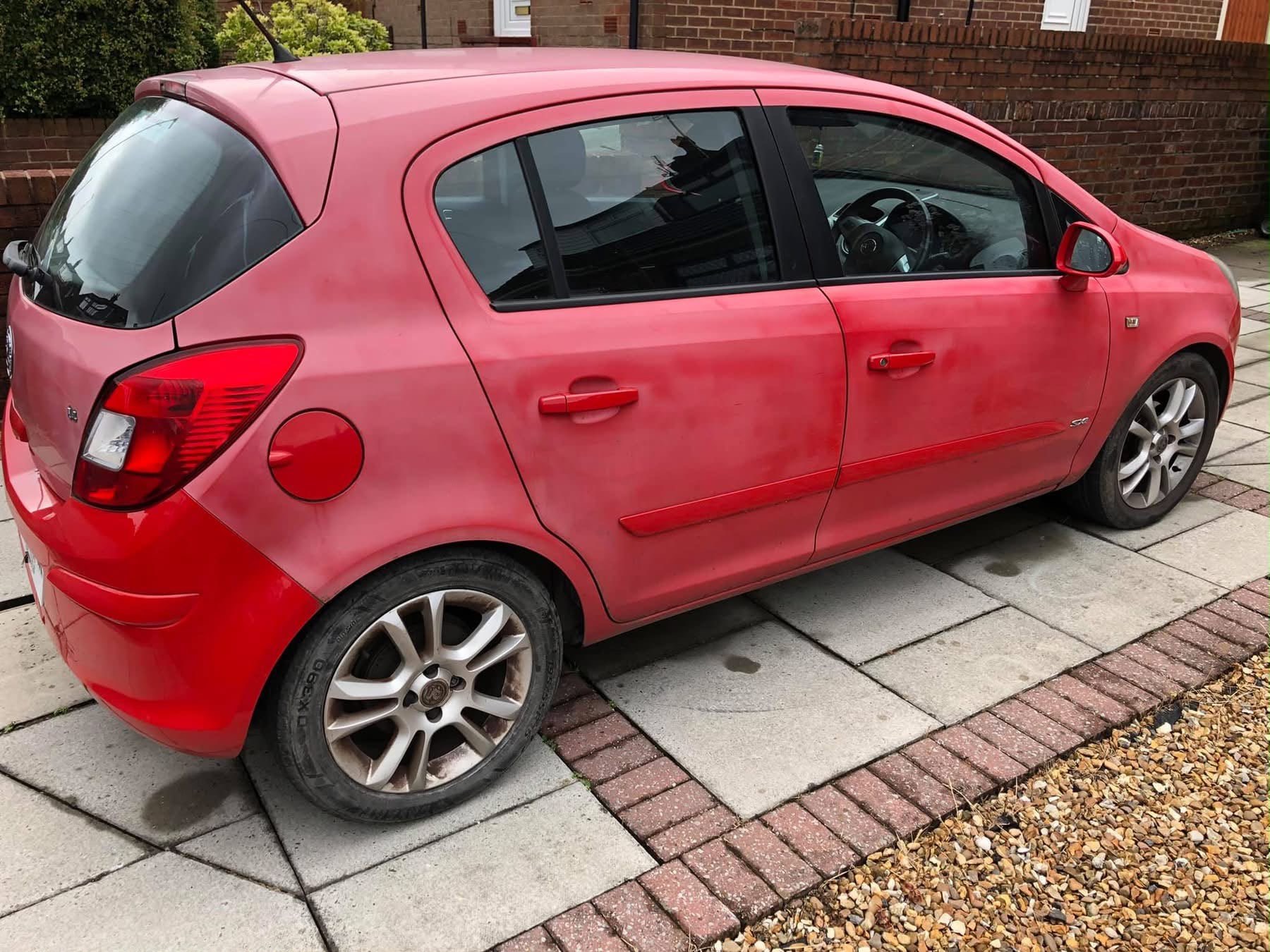 Red Vauxhall Astra detailing work